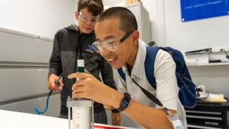 Campers assemble cylinder in lean lab
