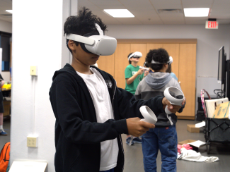Campers play VR