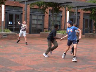Campers playing football