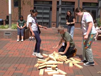 Campers playing in engineering courtyard