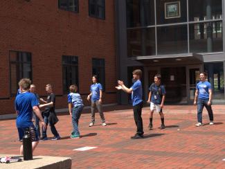 Campers playing in engineering courtyard
