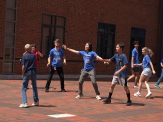 Campers playing in engineering courtyard