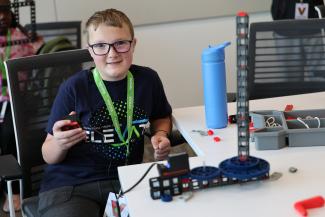 Camper showing his work
