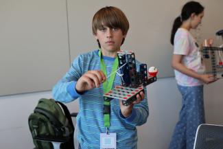 Camper showing his work