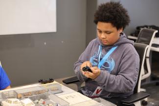 Camper assembles model car