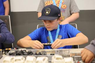 Camper assembles model car