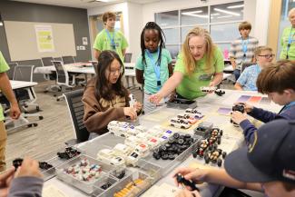 Campers assemble model cars