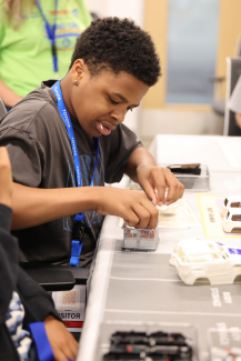 Camper assembles model car