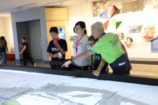 Campers looking at a map